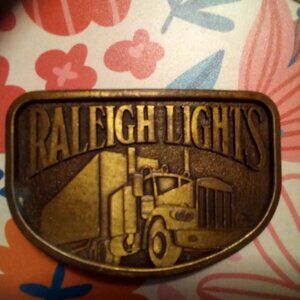Vintage Raleigh Lights Metal Belt Buckle Tractor Trailer Truck New Old Stock